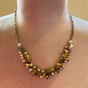 White beads/gold toned metal necklace. Worn several times. Listing #7259
